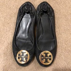 Black and gold flats